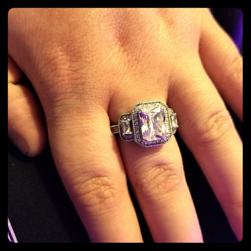 Vintage three stone halo ring